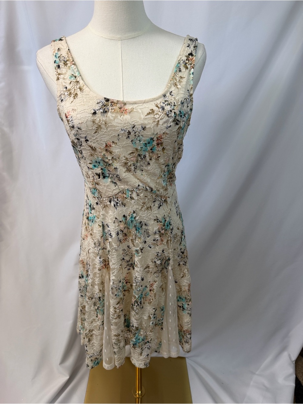 Cinderella Sleeveless Cream Floral Lace Fit & Flare Dress with accent mesh.